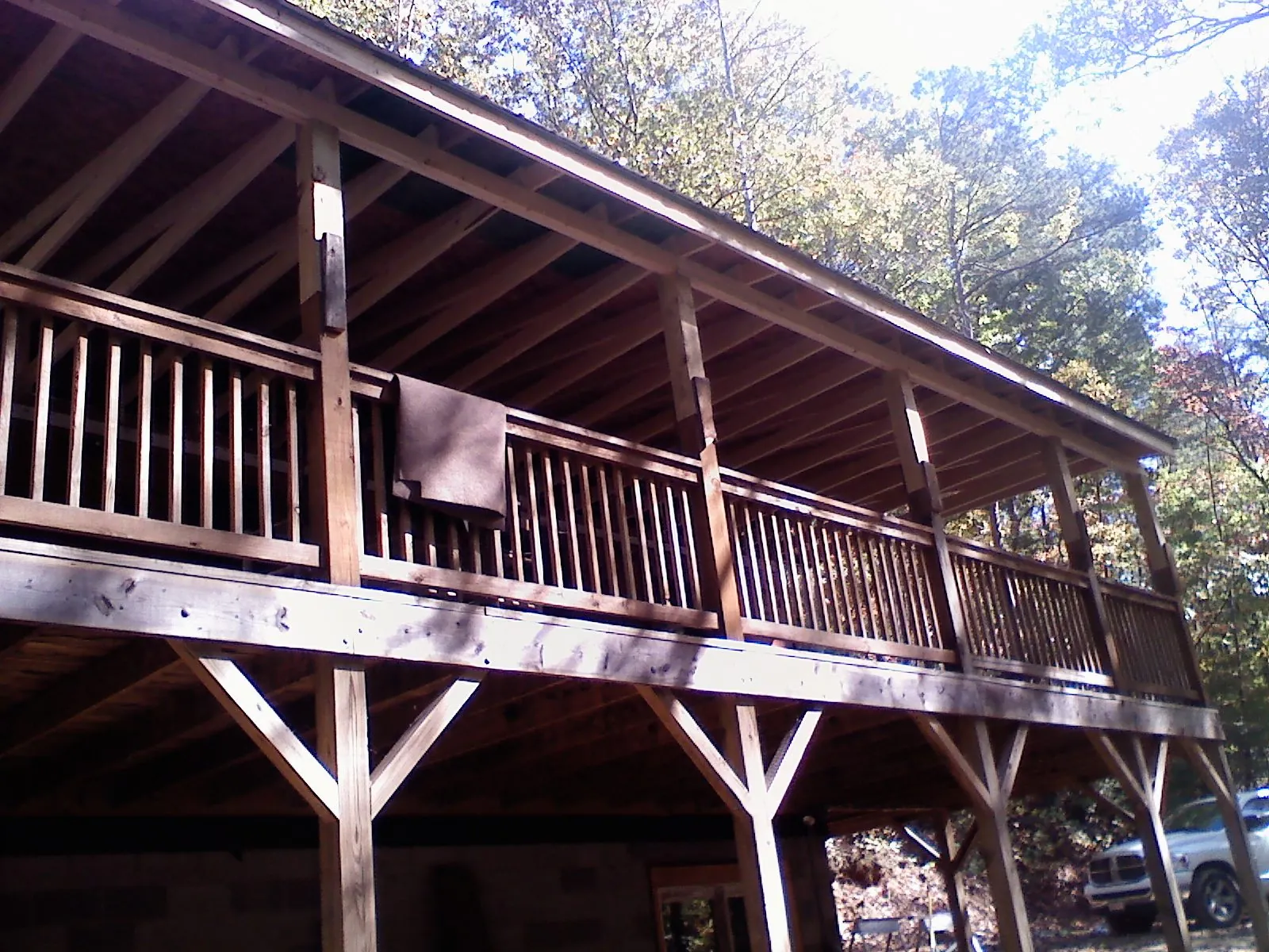 Timber framing under a new elevated porch and deck — Roof Leak Repair in Huntsburg by Roofing Brothers